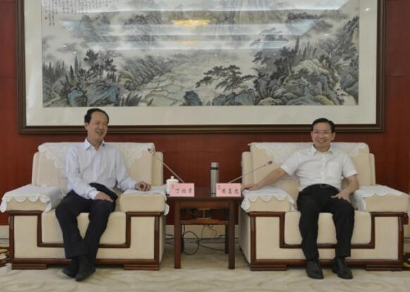 丁焰章拜會南昌市委副書記、市長黃喜忠
